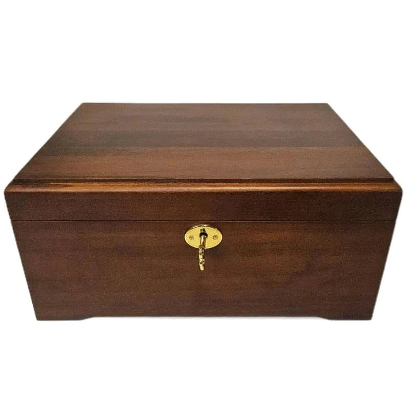 Wooden box with a gold lock on a white background