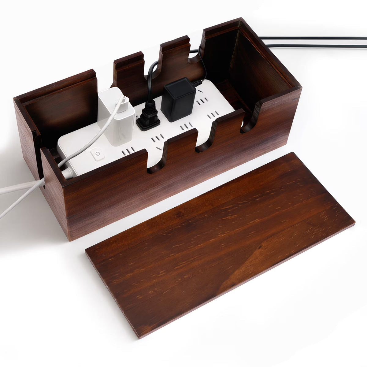 A dark brown wooden cable management box with a matching lid, shown open with a white power strip and cords inside, on a white background.
