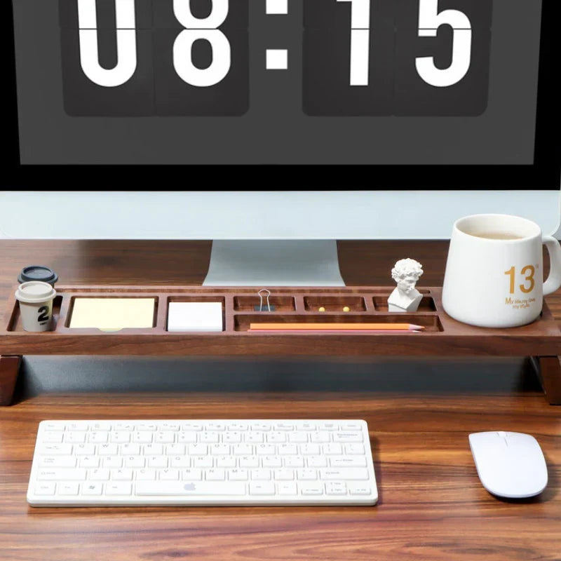 Wooden desk organizer with a computer monitor, keyboard, mouse, and coffee mug.