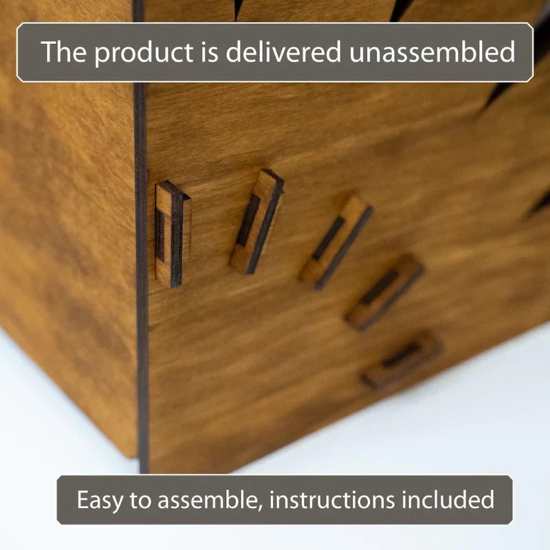 Close-up of a wooden unassembled box or organizer with laser-cut slots and small rectangular pieces, accompanied by text stating 'The product is delivered unassembled' and 'Easy to assemble, instructions included'.