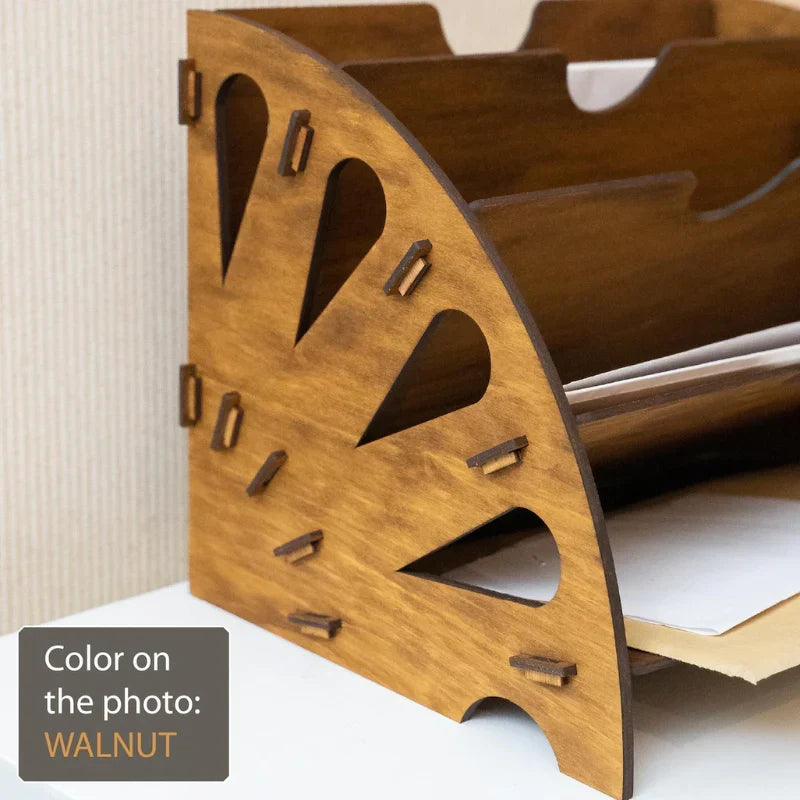 Wooden magazine rack with a walnut finish on a white background