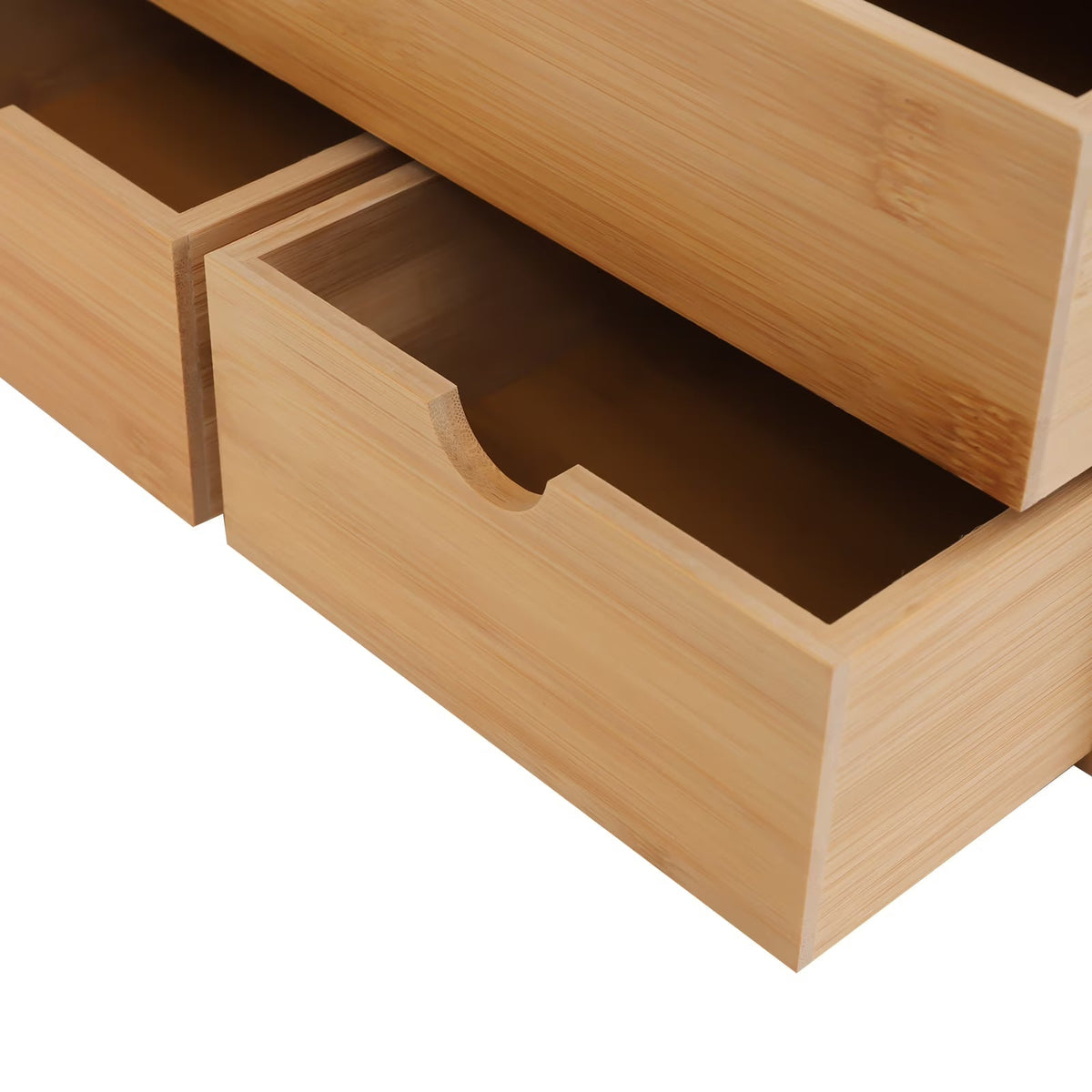 Wooden drawer unit with open drawers on a white background