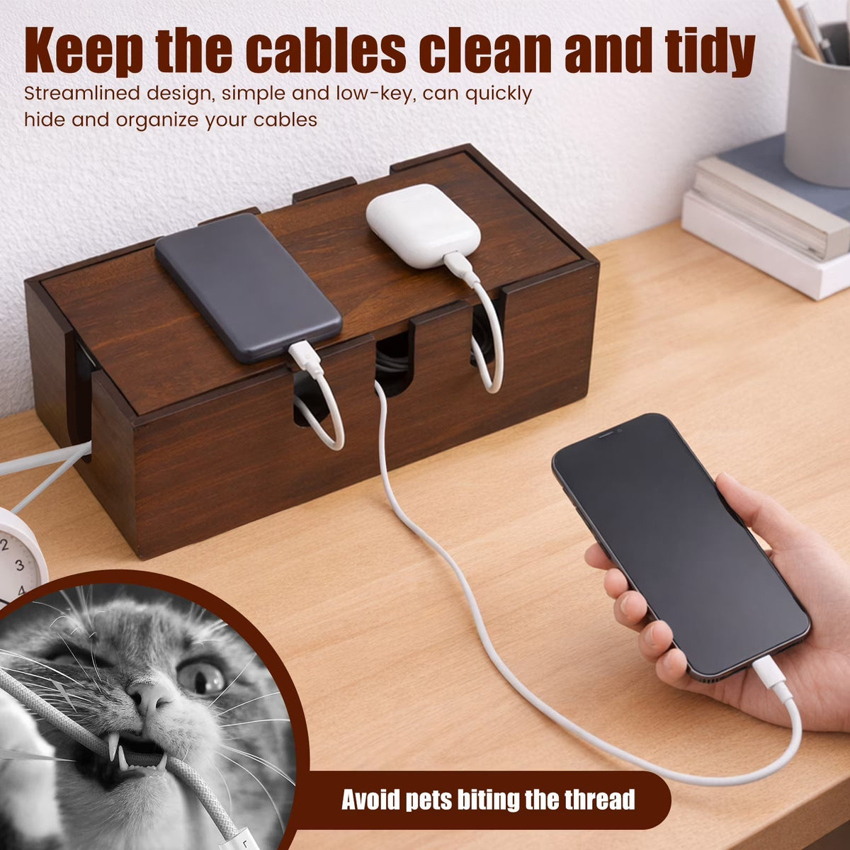 A wooden cable management box with multiple cable ports on a desk, shown with two charging cables and two smartphones. A hand is holding one smartphone connected to the box, and the scene includes promotional text and a small inset photo of a cat.